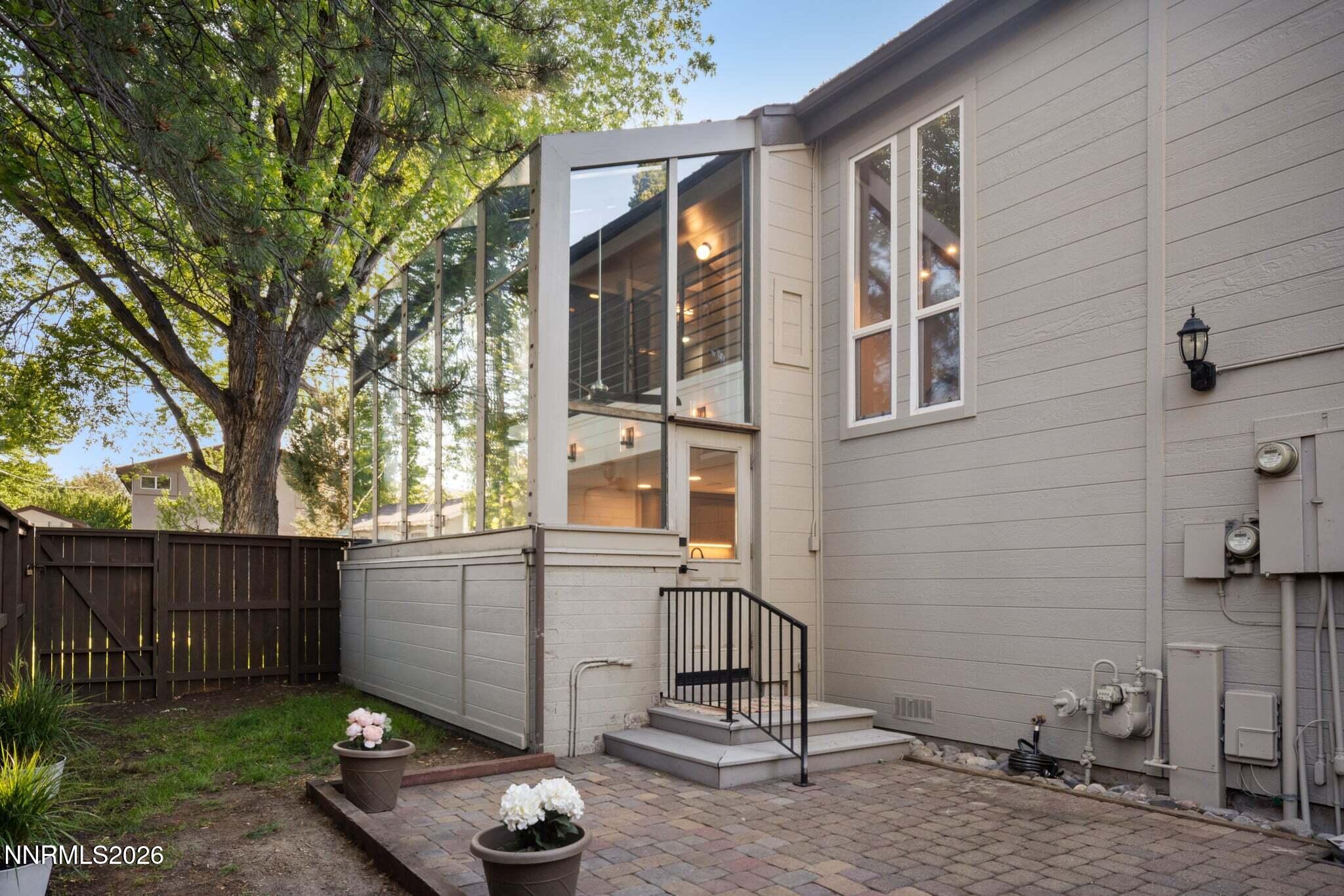 430 Angela Place Reno, NV 89509 - Photo 1 of 48 a view of a backyard with a large tree