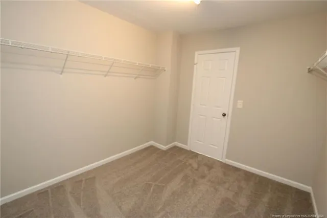 a view of a room with racks on the wall