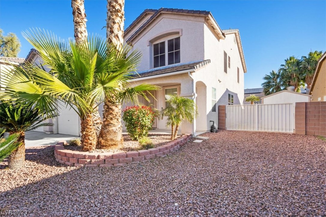 7908 Midnight Ride Street Las Vegas, NV 89131 - Photo 2 of 49 Desert Landscaping and an RV Gate