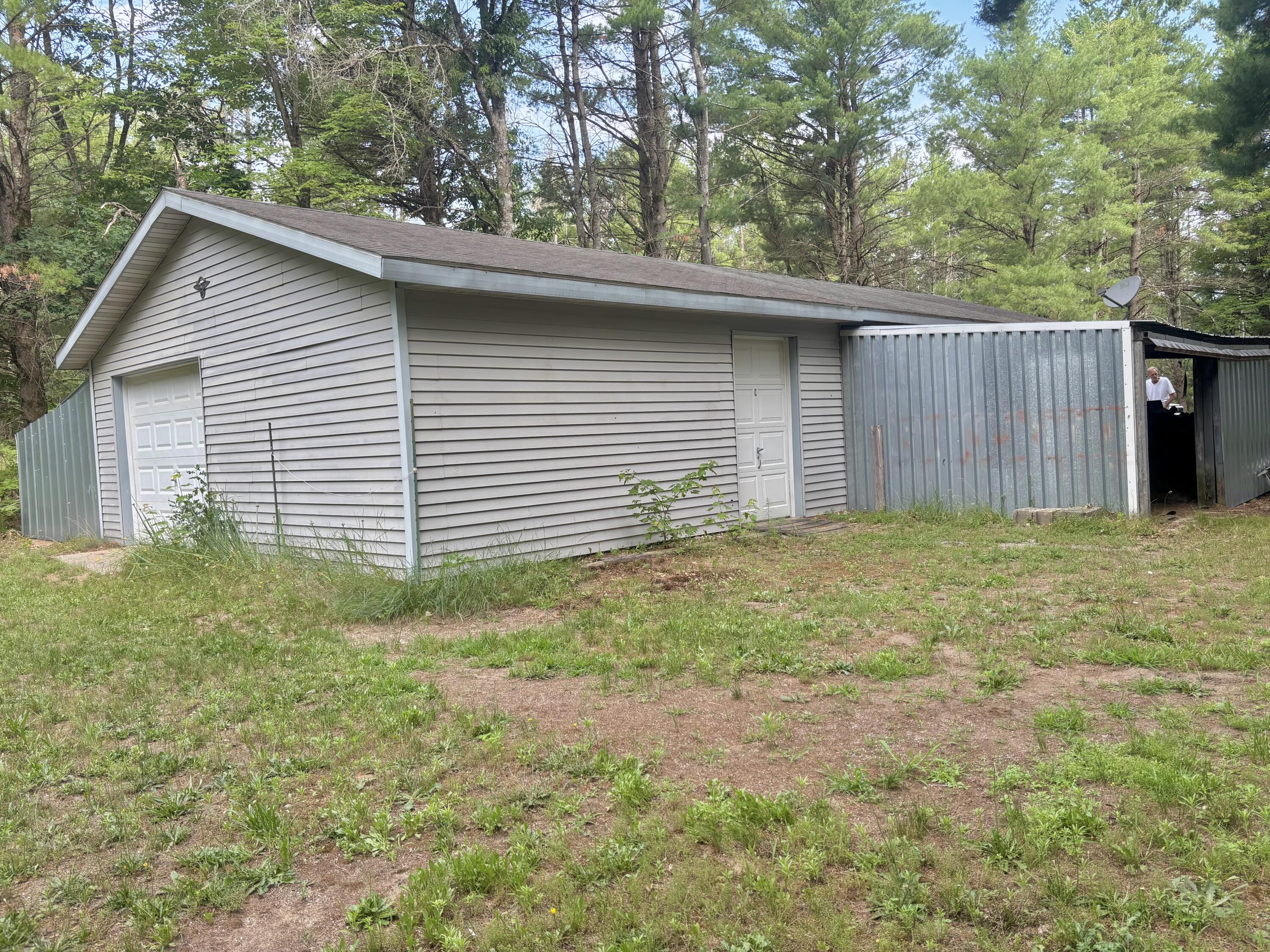 2594 South Forman Road Baldwin, MI 49304 - Photo 4 of 28 Back garage