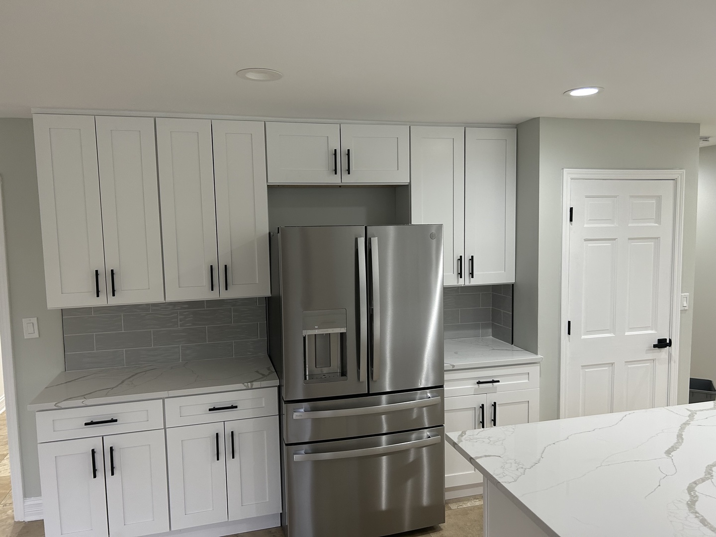 Undisclosed Address Naperville, IL 60563 - Photo 11 of 43 a kitchen with a refrigerator sink and cabinets