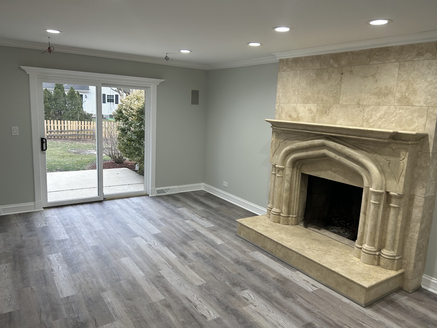 Undisclosed Address Naperville, IL 60563 - Photo 16 of 43 a view of an empty room with wooden floor and a window