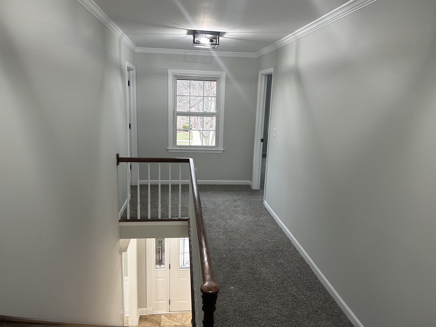 Undisclosed Address Naperville, IL 60563 - Photo 20 of 43 wooden floor in an empty room with a window