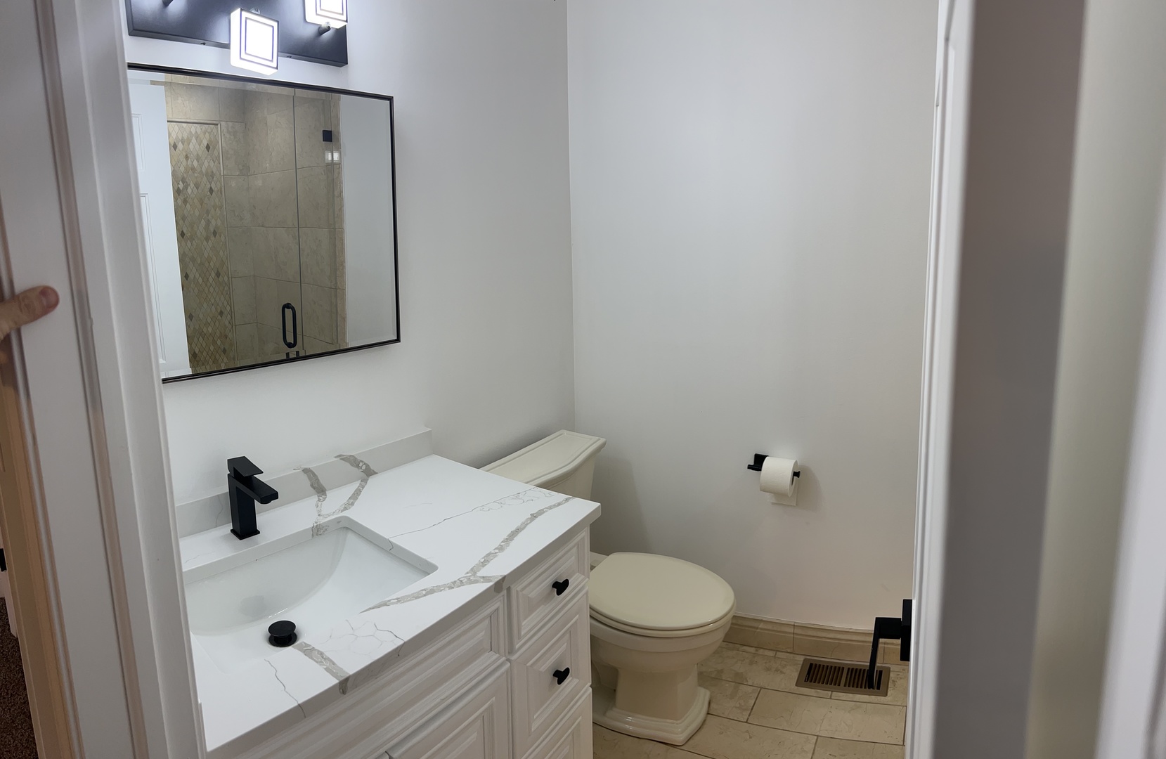 Undisclosed Address Naperville, IL 60563 - Photo 27 of 43 a bathroom with a sink a toilet and shower