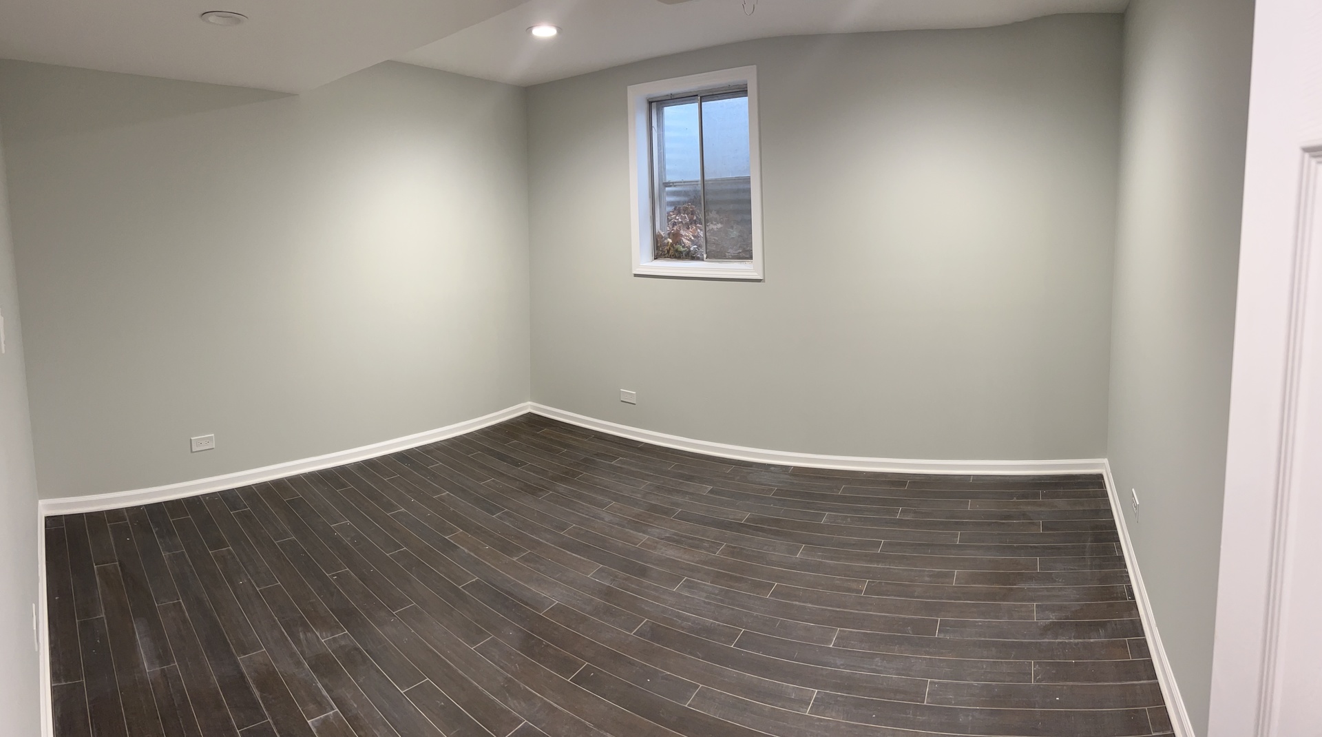 Undisclosed Address Naperville, IL 60563 - Photo 38 of 43 a view of an empty room with wooden floor and a window