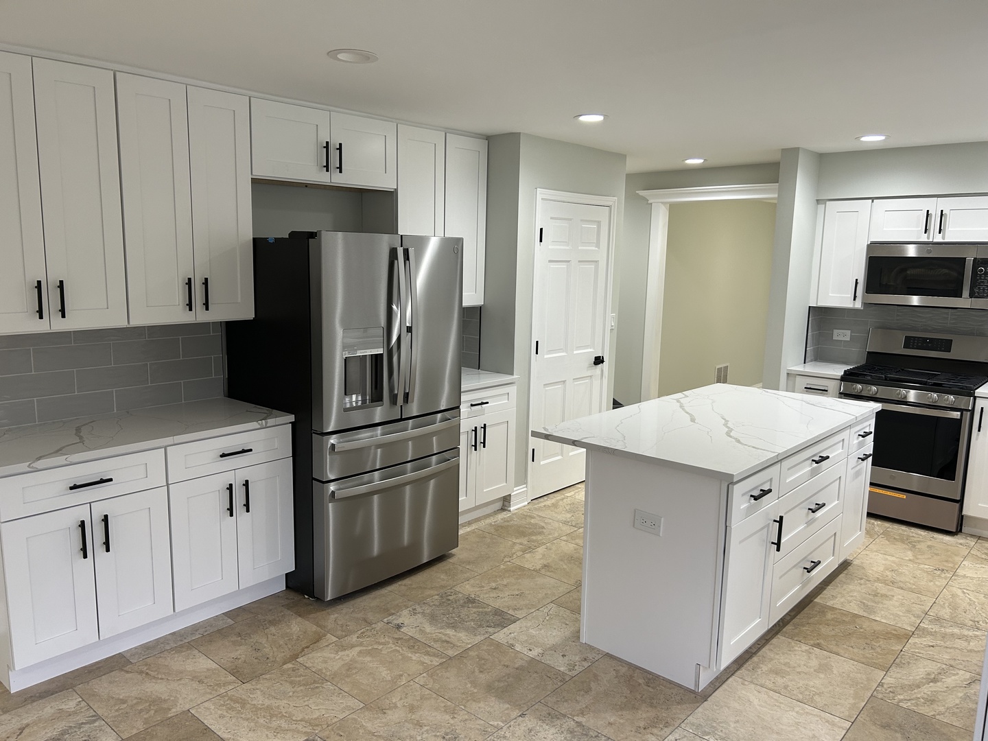 Undisclosed Address Naperville, IL 60563 - Photo 9 of 43 a kitchen with stainless steel appliances granite countertop a refrigerator stove a sink and dishwasher