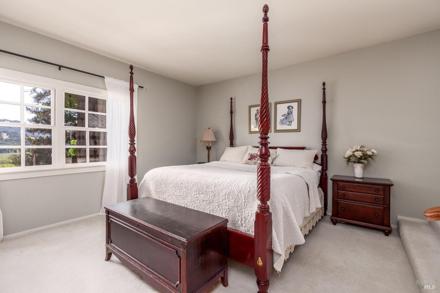 5700 Old River Road Ukiah, CA 95482 - Photo 27 of 56 a bedroom with bed and a window
