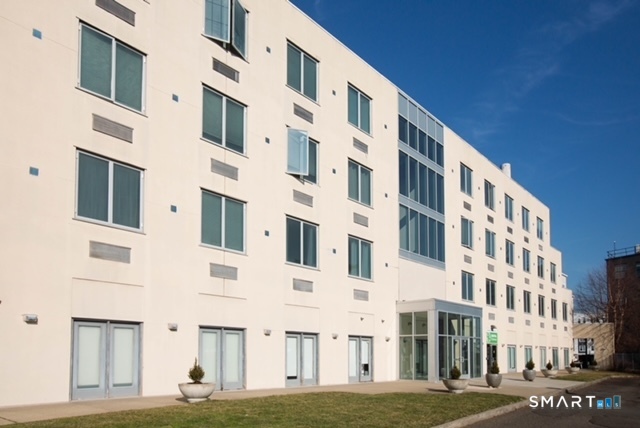 49 Day Street, Unit 404 Norwalk, CT 06854 - Photo 2 of 11 a front view of a building