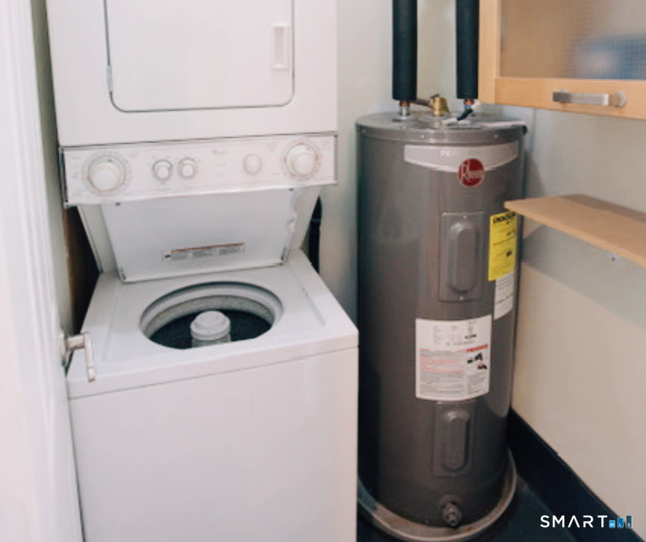 49 Day Street, Unit 404 Norwalk, CT 06854 - Photo 9 of 11 a utility room with dryer and washer