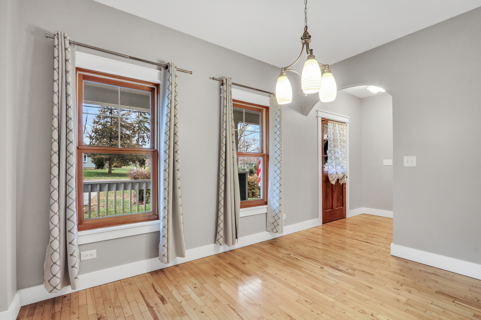 350 South Alleghany Road Grayslake, IL 60030 - Photo 19 of 54 a view of a room with wooden floor and windows