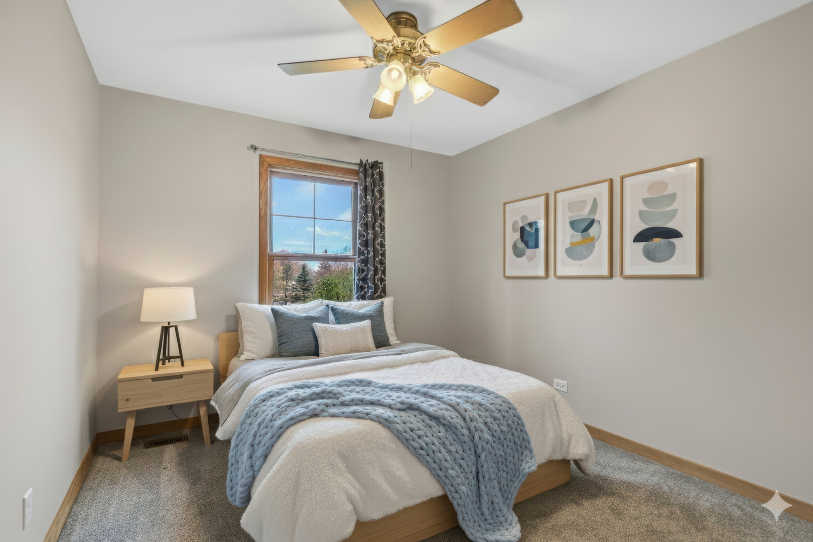 350 South Alleghany Road Grayslake, IL 60030 - Photo 34 of 54 a bedroom with a bed and a chandelier