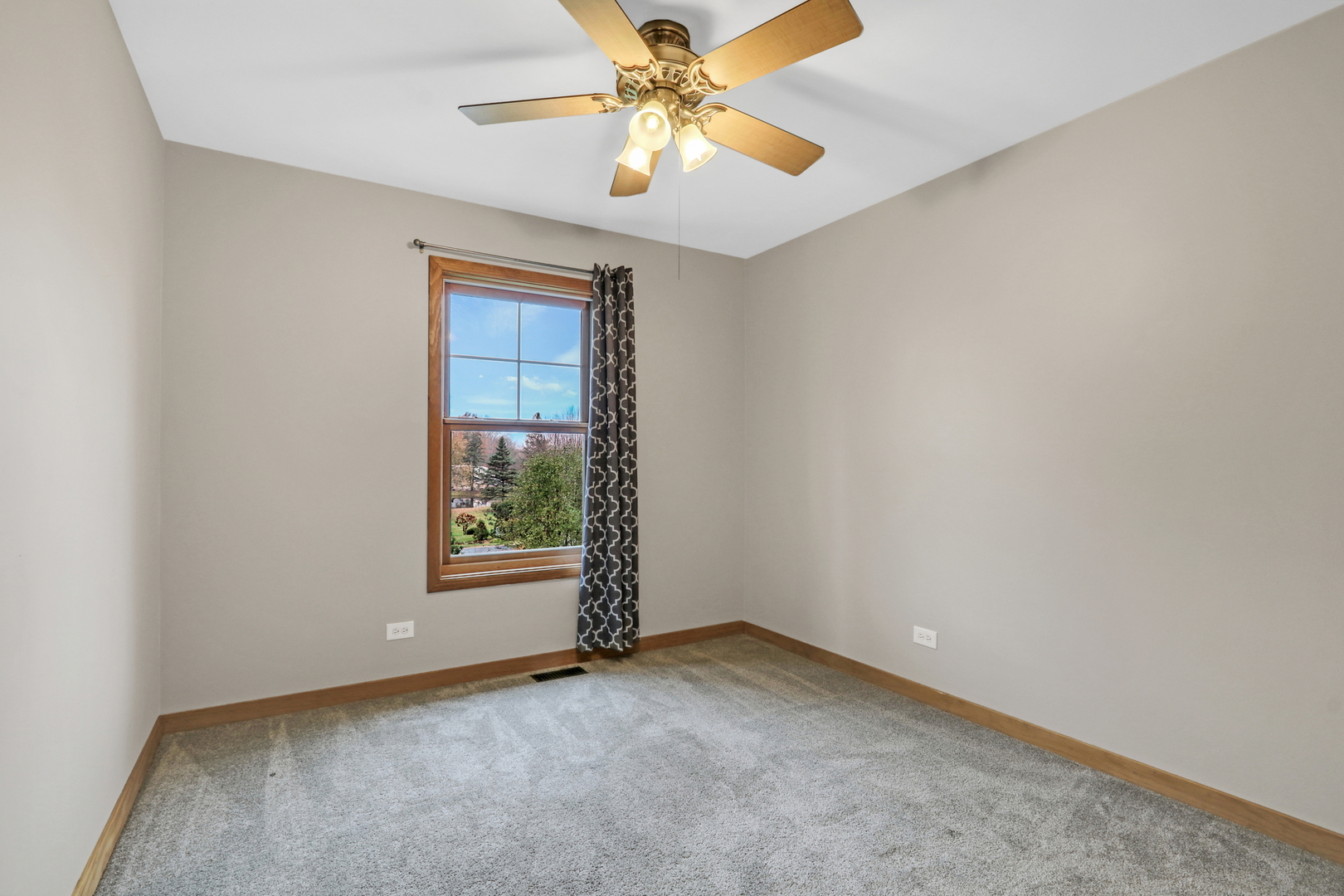 350 South Alleghany Road Grayslake, IL 60030 - Photo 35 of 54 an empty room with windows and fan