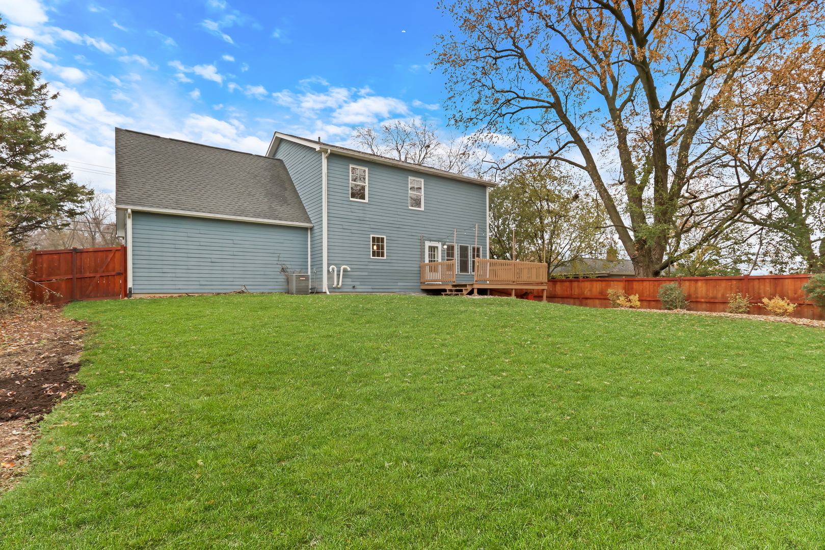 350 South Alleghany Road Grayslake, IL 60030 - Photo 47 of 54 a front view of house with yard and trees
