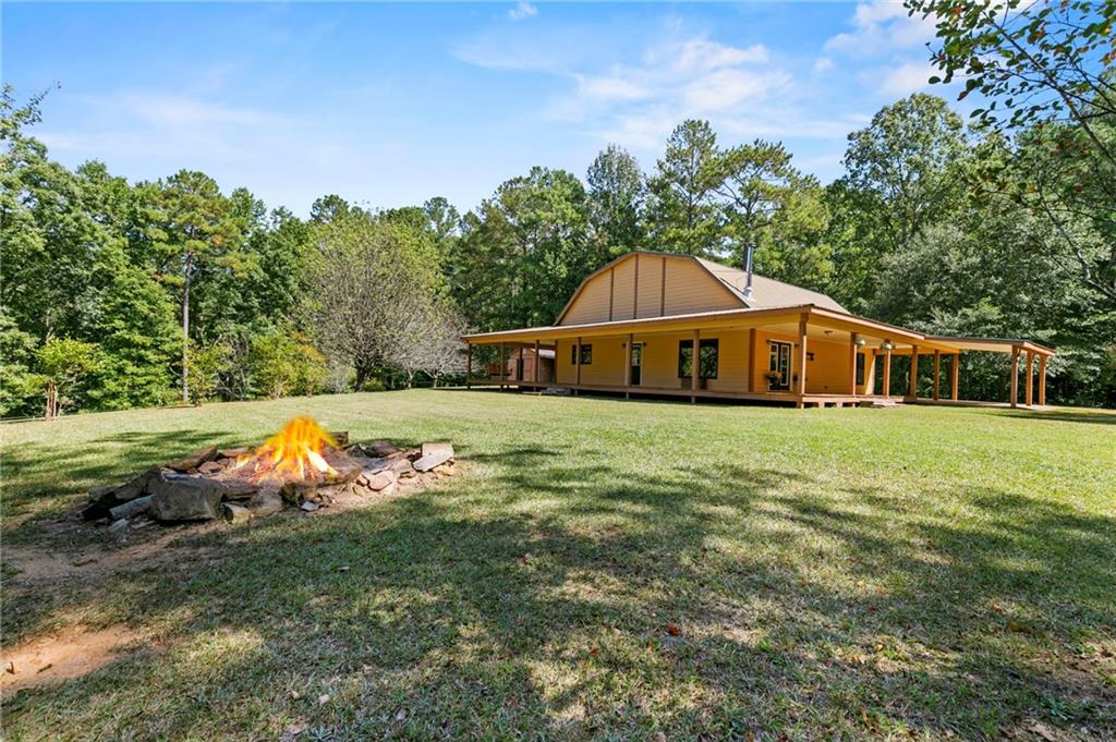 1025 South Bridge Road Franklin, GA 30217 - Photo 1 of 1 a view of a house with a yard