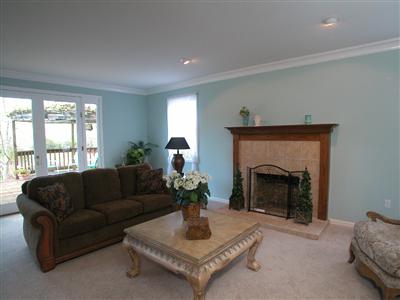4104 Wallace Road Santa Rosa, CA 95404 - Photo 6 of 9 a living room with furniture and a fireplace