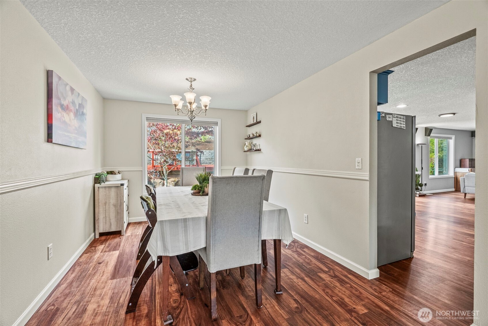 2410 North Heron Drive Ridgefield, WA 98642 - Photo 12 of 40 a view of a dining room with furniture window and wooden floor