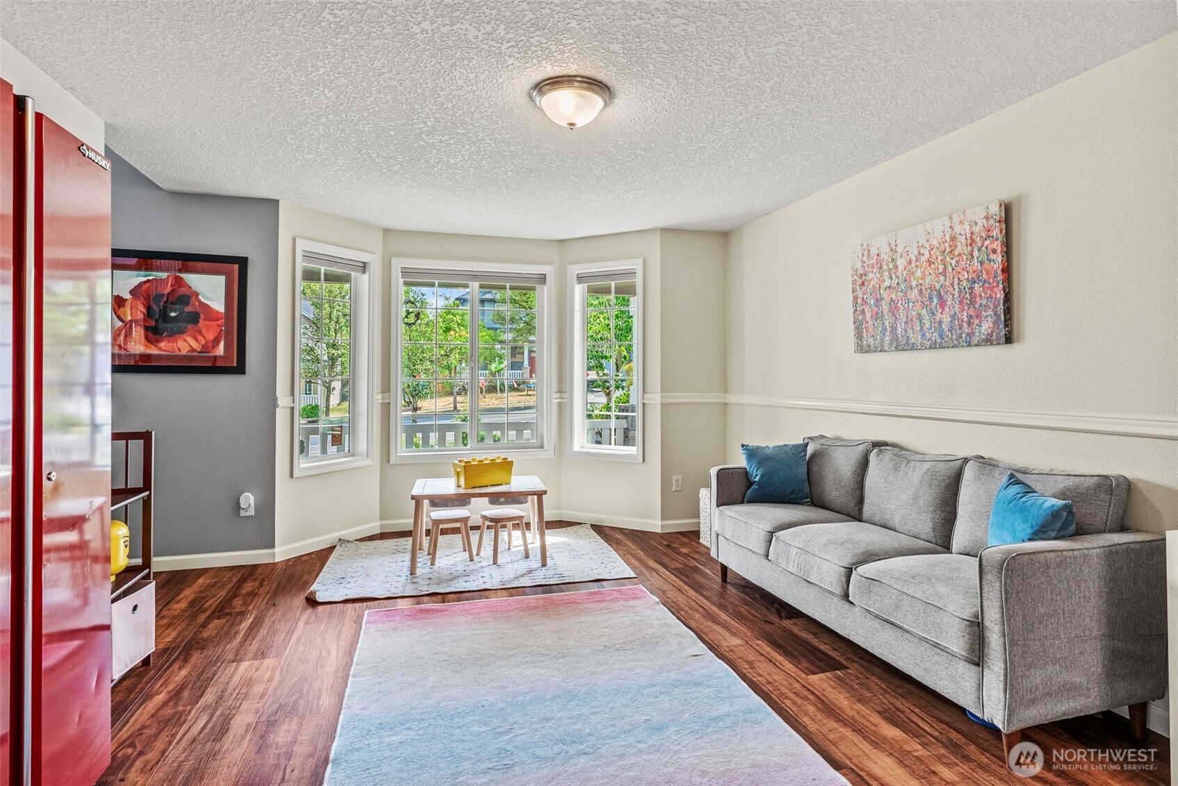 2410 North Heron Drive Ridgefield, WA 98642 - Photo 14 of 40 a living room with furniture and a large window