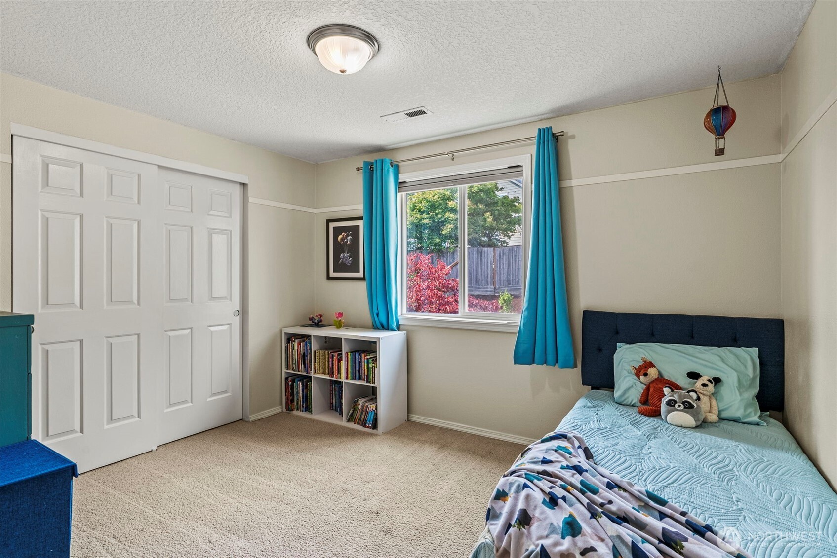 2410 North Heron Drive Ridgefield, WA 98642 - Photo 27 of 40 a bedroom with a bed and a window