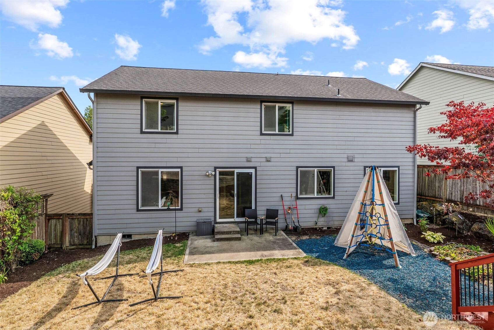 2410 North Heron Drive Ridgefield, WA 98642 - Photo 34 of 40 a view of a house with a patio