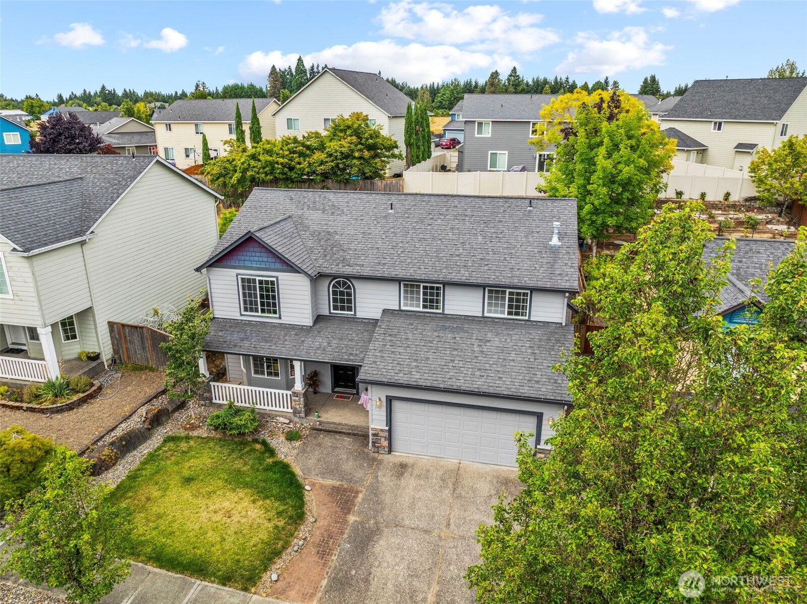2410 North Heron Drive Ridgefield, WA 98642 - Photo 38 of 40 aerial view of a house with a yard and potted plants