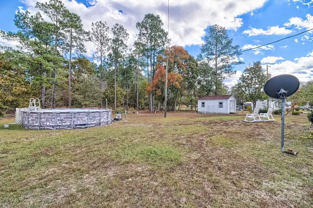 a house view with a garden space