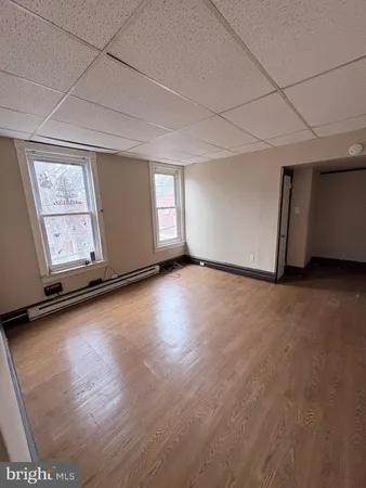 a view of an empty room and window