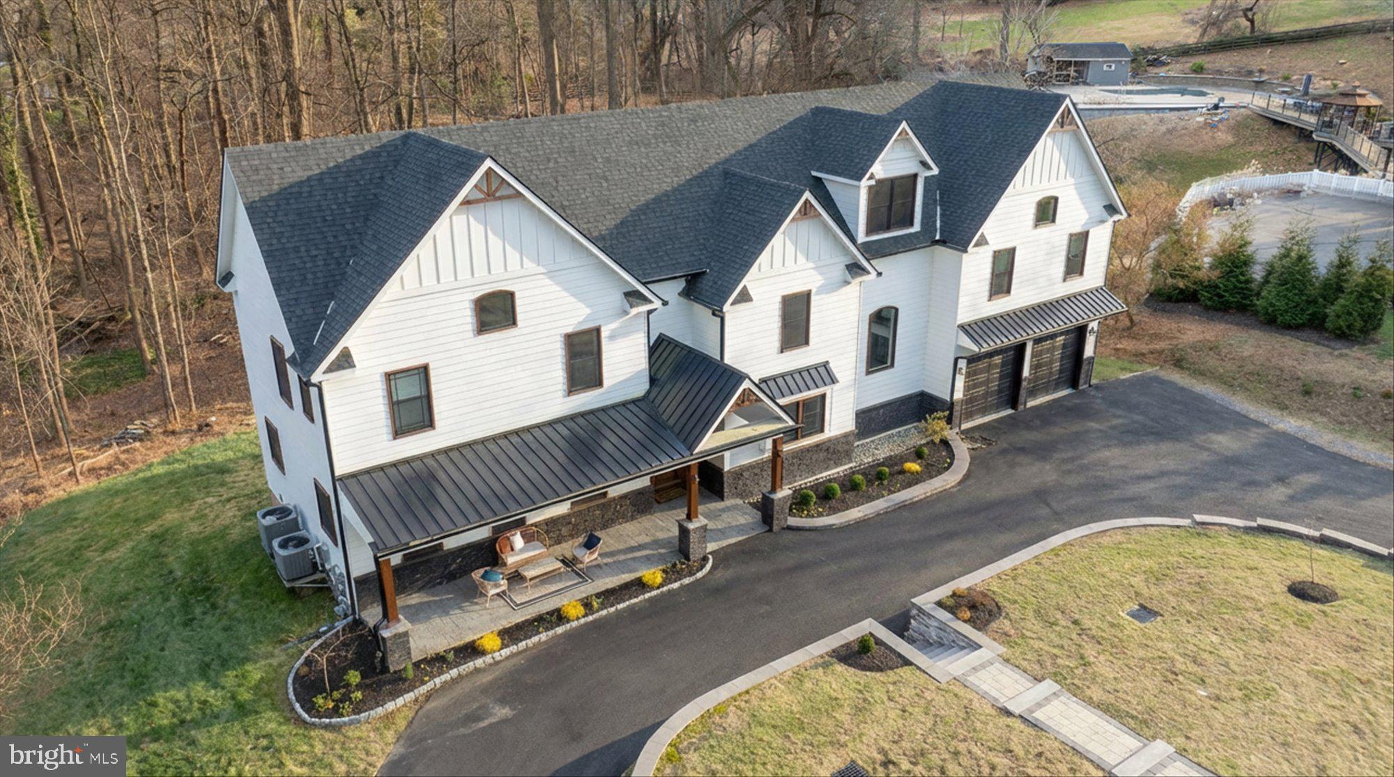 8 Chipmunk Lane Media, PA 19063 - Photo 2 of 51 an aerial view of a house with backyard