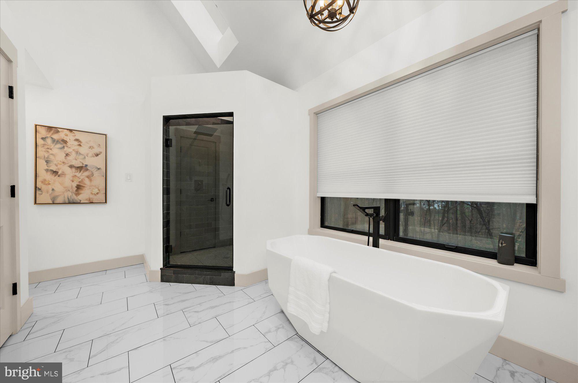 8 Chipmunk Lane Media, PA 19063 - Photo 22 of 51 a bathroom with a tub and a shower