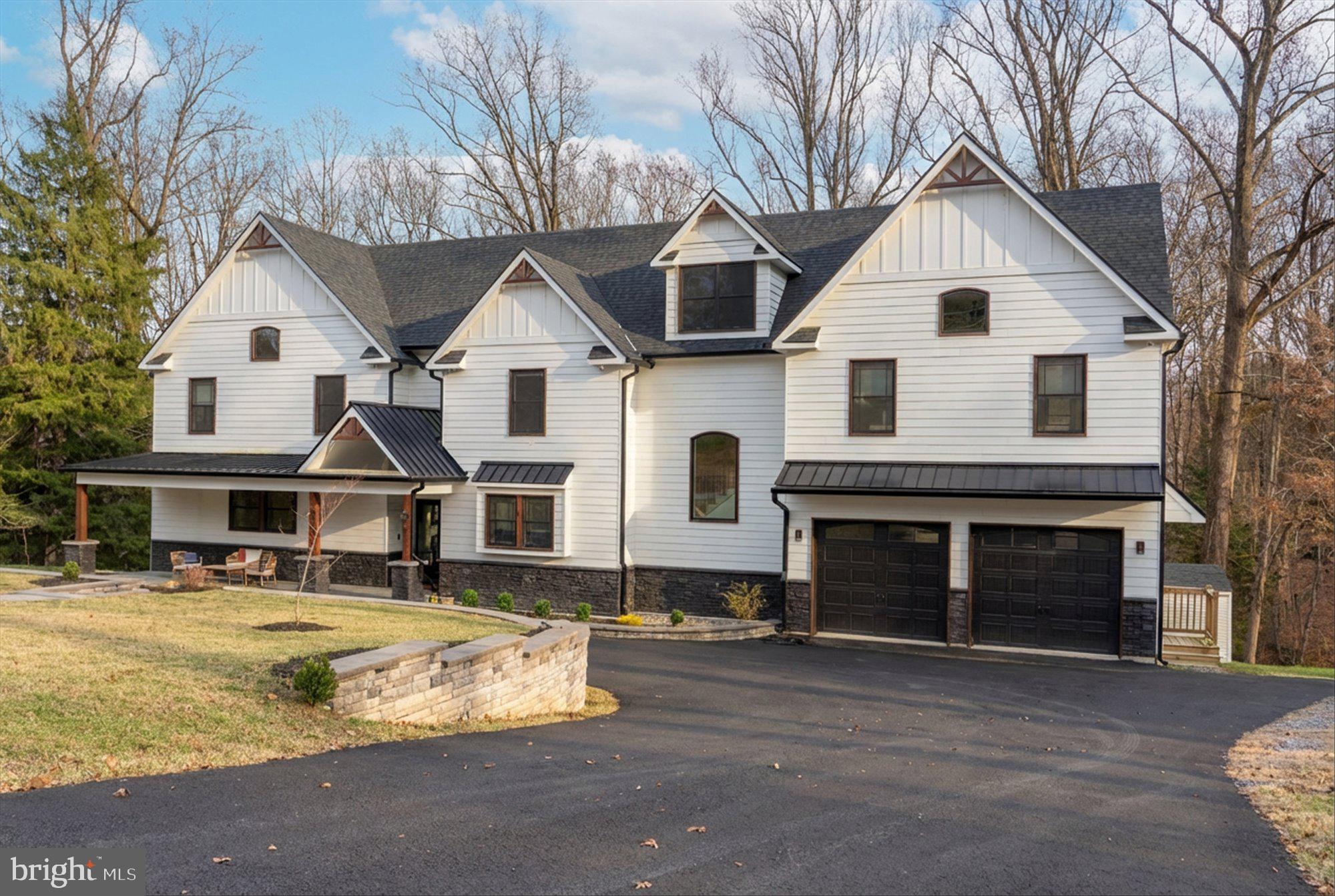 8 Chipmunk Lane Media, PA 19063 - Photo 45 of 51 a front view of a house with a yard