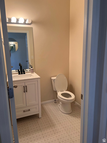 2001 Fielding Hill Lane Draper, UT 84020 - Photo 9 of 21 Half bath with vanity and toilet
