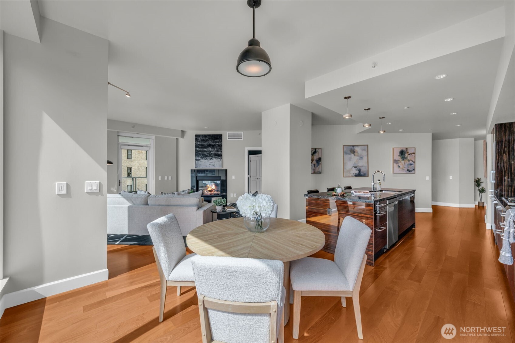 1920 4th Avenue, Unit 602 Seattle, WA 98101 - Photo 11 of 35 a view of a dining room with furniture