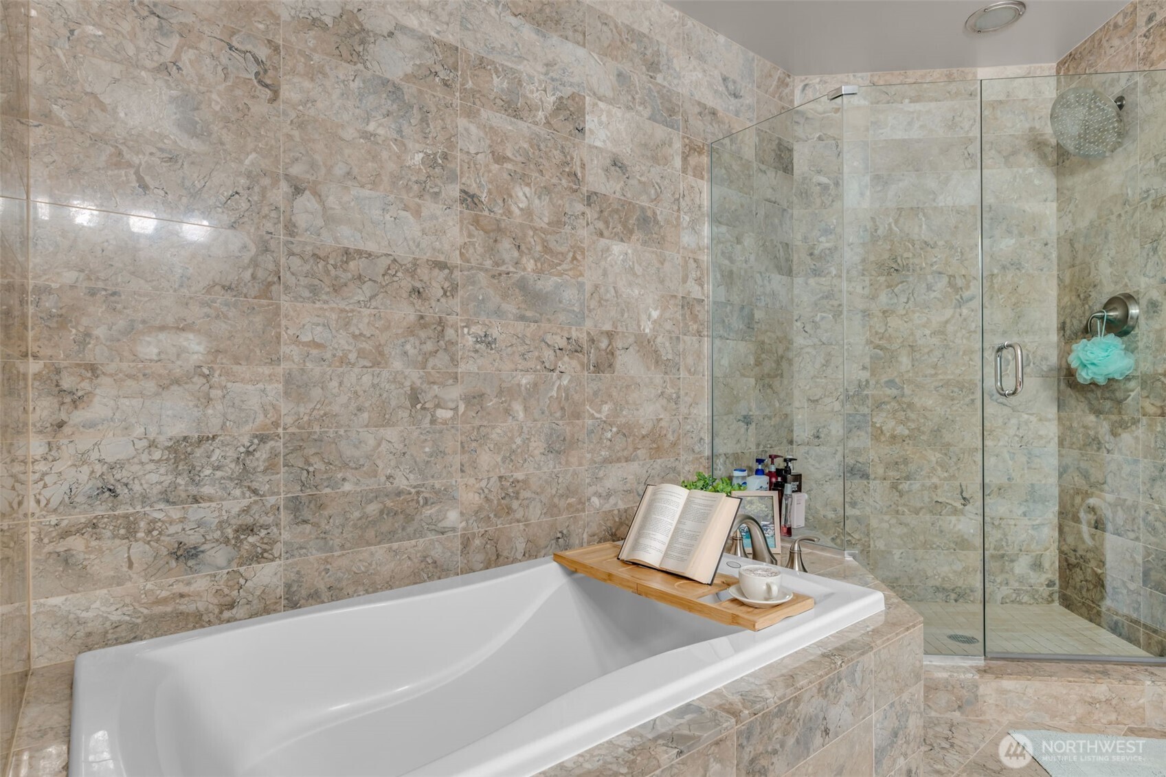 1920 4th Avenue, Unit 602 Seattle, WA 98101 - Photo 24 of 35 a bathroom with a bathtub and shower