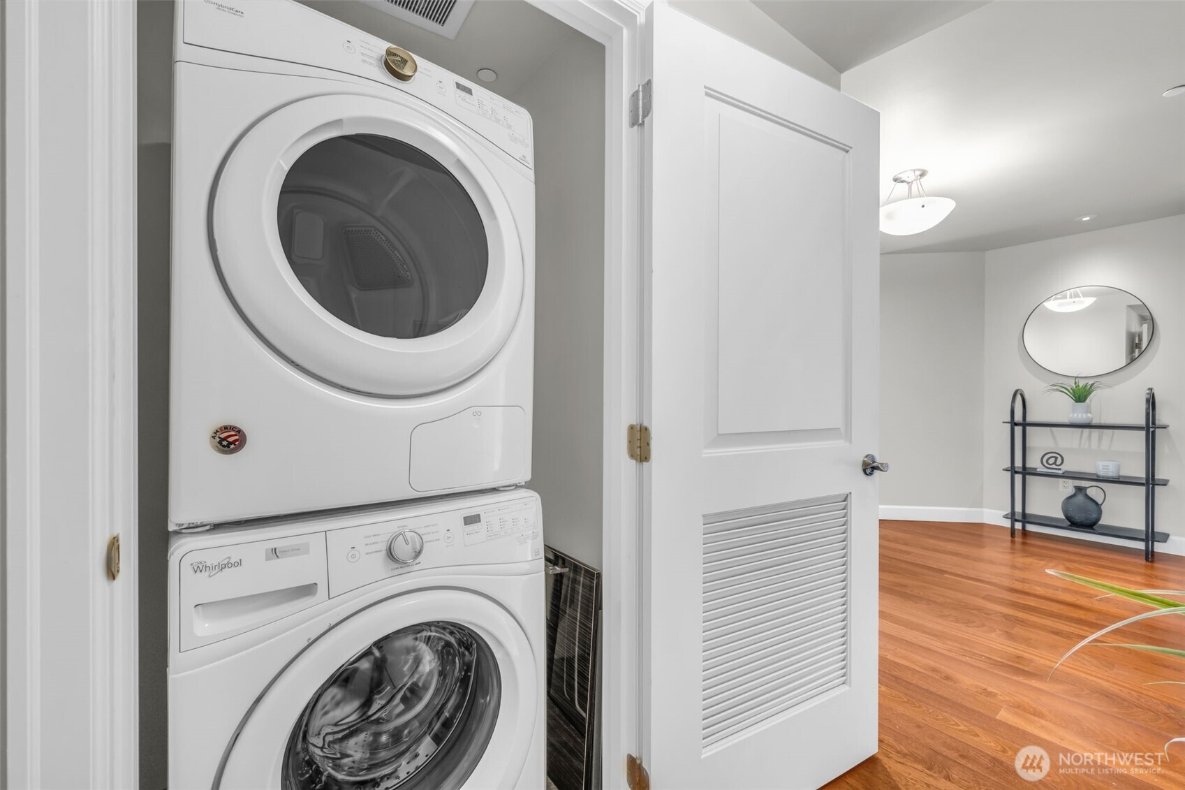 1920 4th Avenue, Unit 602 Seattle, WA 98101 - Photo 27 of 35 a view of a livingroom with washer and dryer