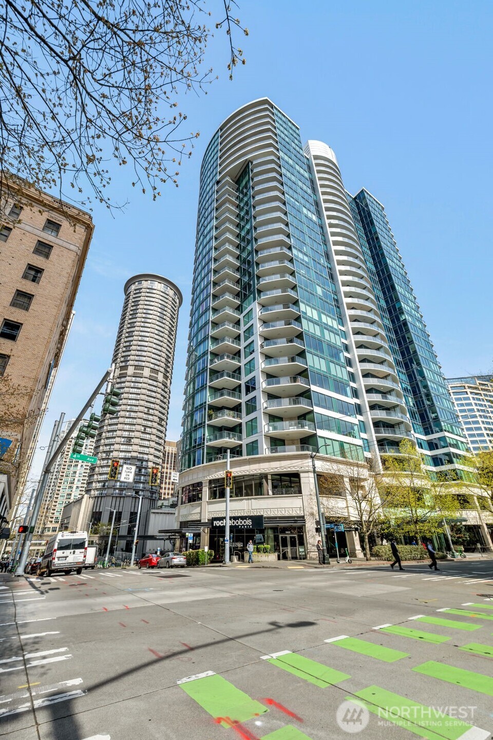 1920 4th Avenue, Unit 602 Seattle, WA 98101 - Photo 33 of 35 a view of a tall building next to a road