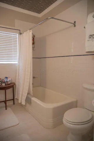 an aerial view of a residential houses with outdoor space