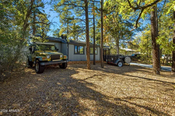 a car parked in front of a house
