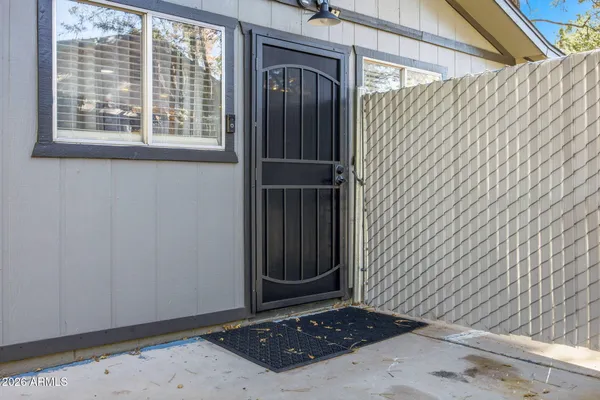a view of a door and a sink
