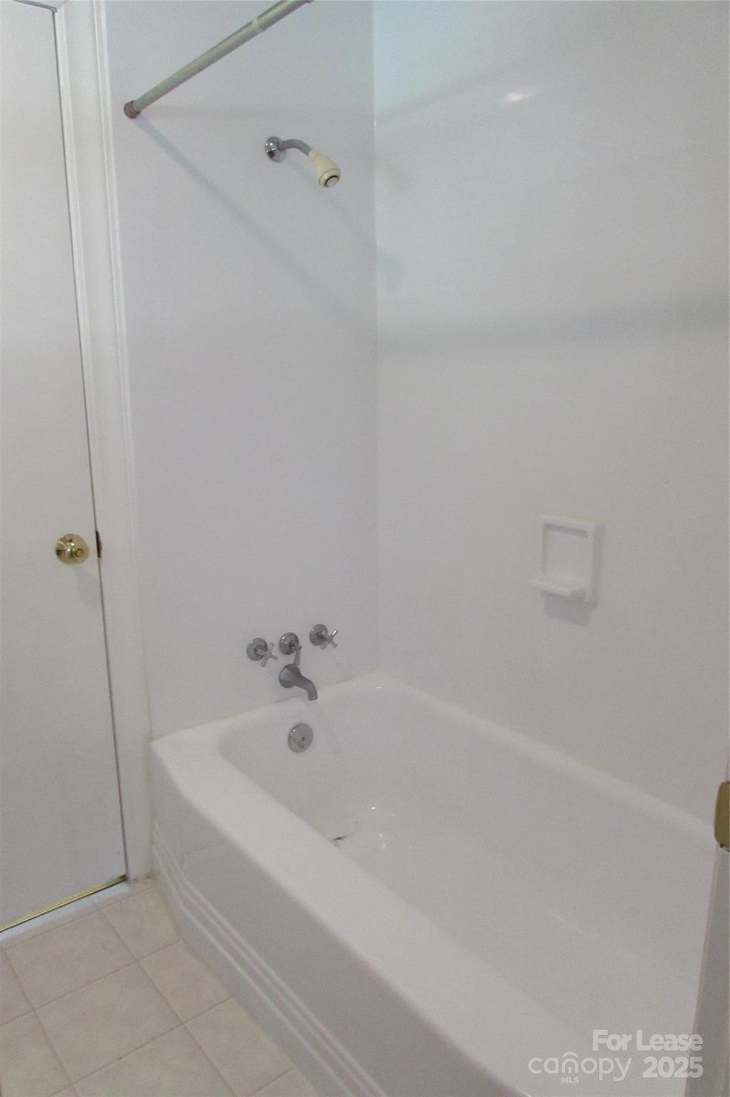 501 Dunham Road Gastonia, NC 28054 - Photo 17 of 28 a white bath tub with a shower