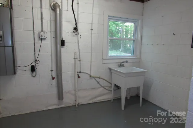 a bathroom with a sink and a shower