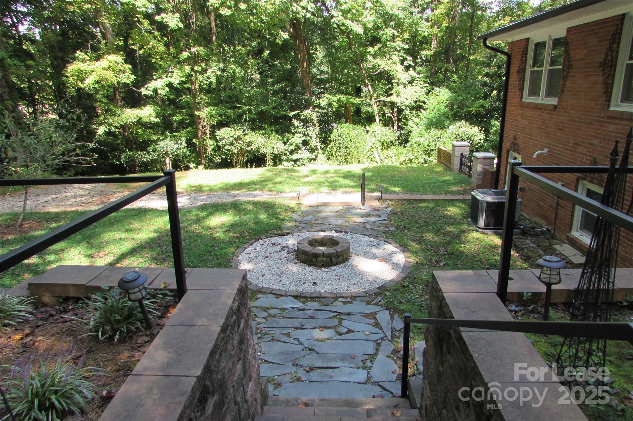 501 Dunham Road Gastonia, NC 28054 - Photo 28 of 28 a view of a garden with sitting area