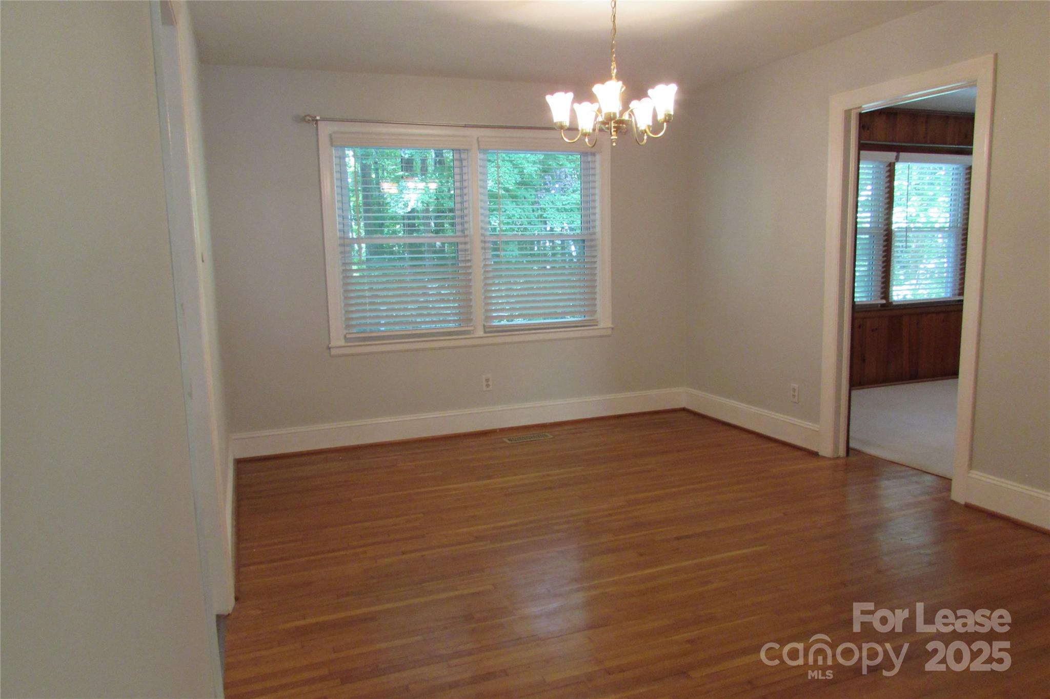 501 Dunham Road Gastonia, NC 28054 - Photo 6 of 28 a view of livingroom with hardwood floor and window