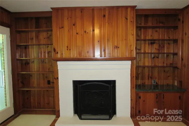a living room with a fireplace