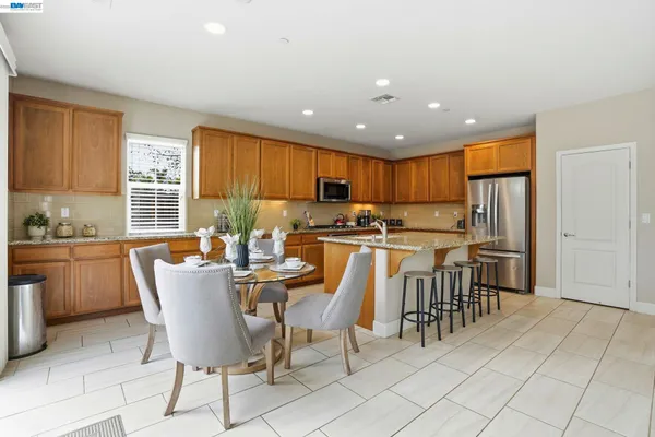 a living room with furniture and windows