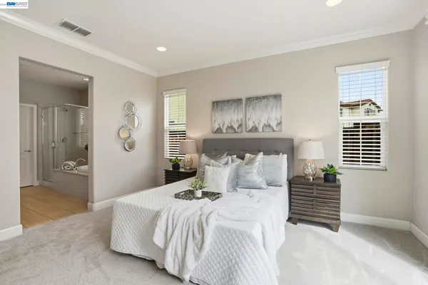 a bathroom with a sink toilet and mirror