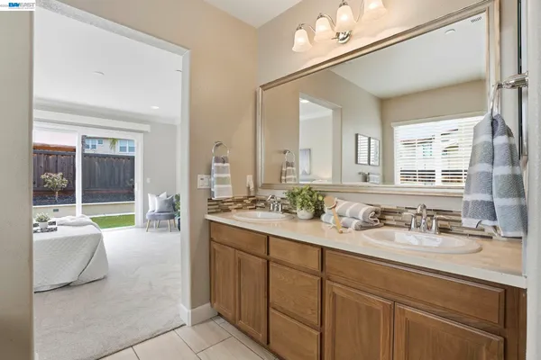 a view of a backyard with potted plants