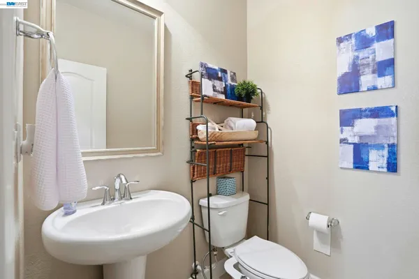 a view of a house with a swimming pool and outdoor seating