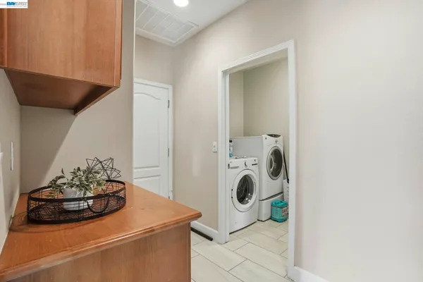 an aerial view of residential houses with outdoor space and swimming pool