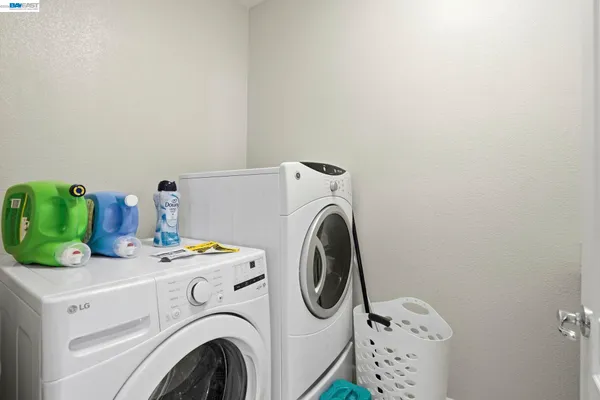 an aerial view of residential houses with yard