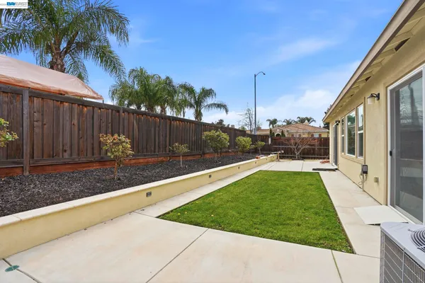 a street view with wooden fence
