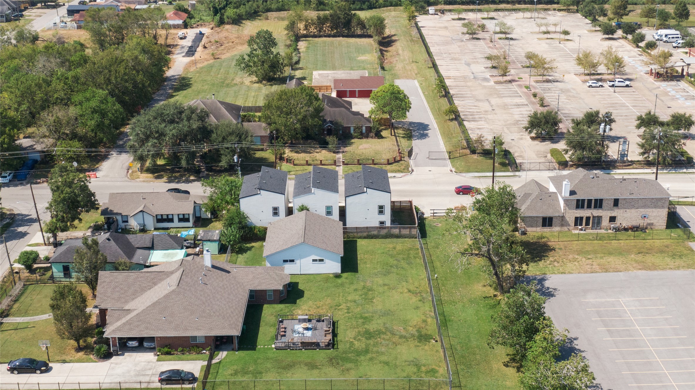 7089 Tierwester Street Houston, TX 77021 - Photo 33 of 35 an aerial view of residential houses with outdoor space and parking